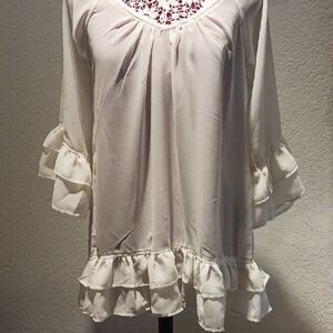 Chic Cream Ruffled Tunic with Red Accents